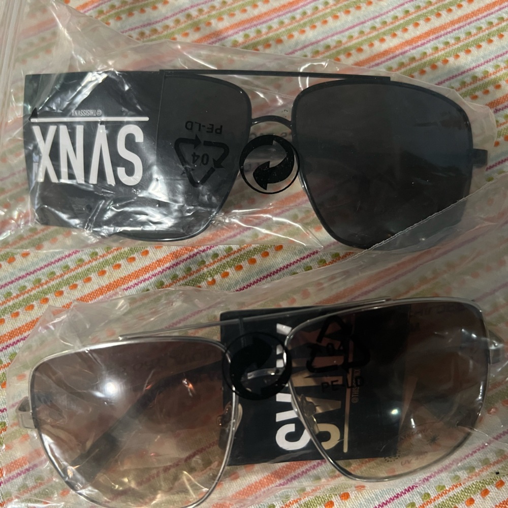 Set of Two SVNX Aviator Sunglasses. One Black, One Brass. Still in packaging.